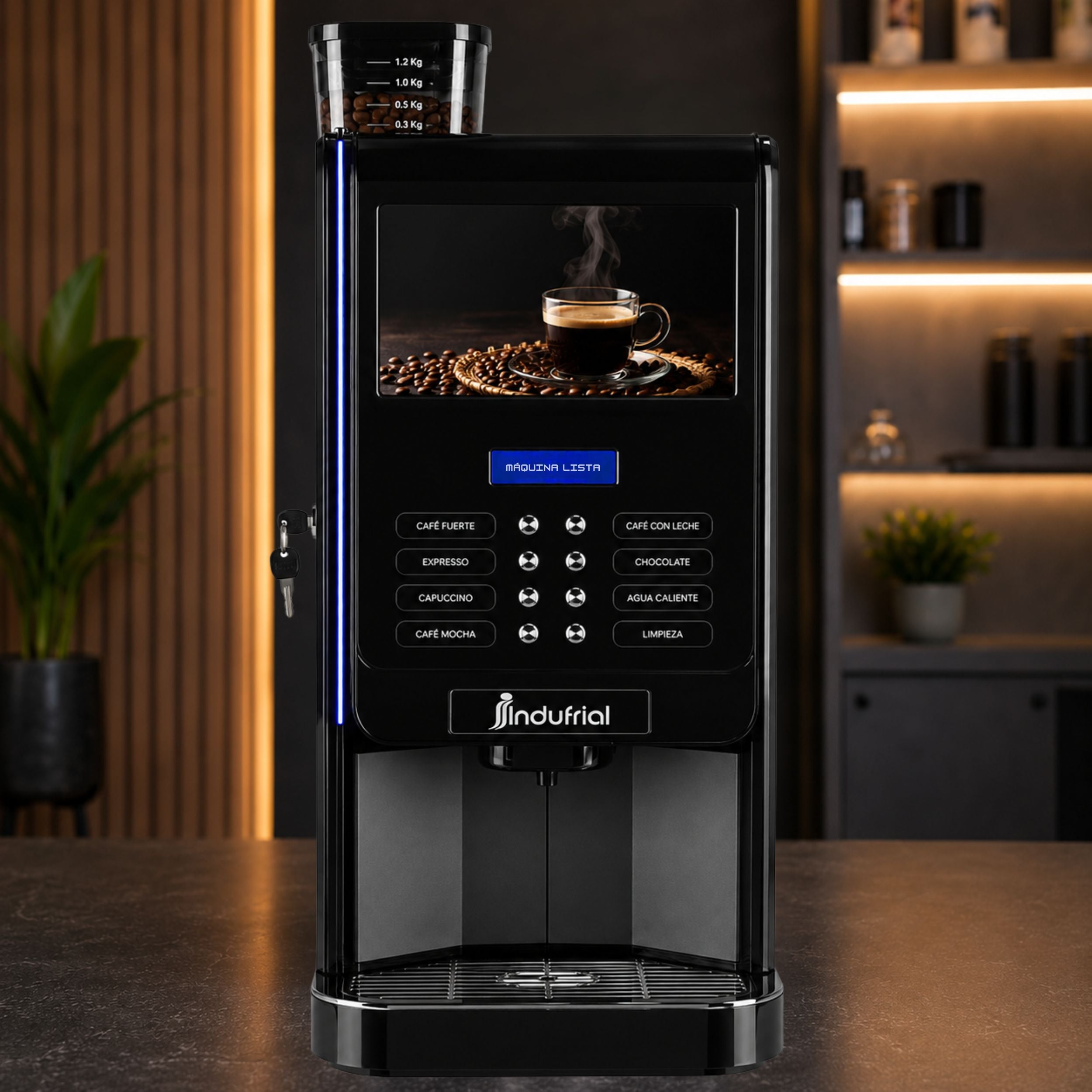 Cafetera comercial Golden Paris E2S instalada en oficina, cafetería u hotel con pantalla multimedia y panel frontal.